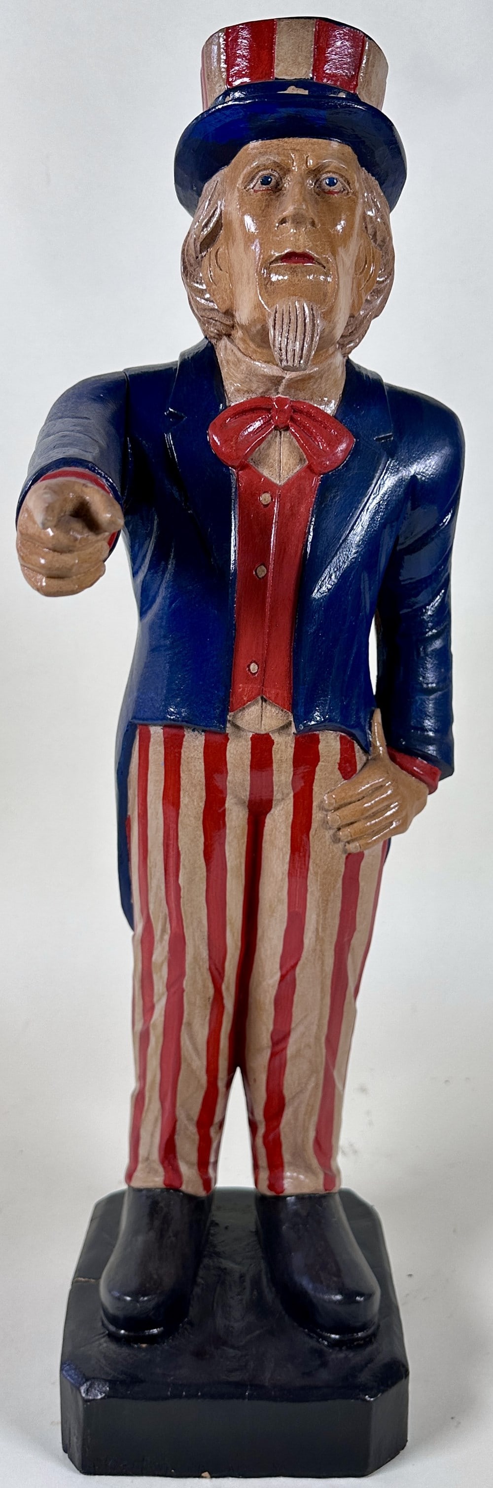 UNCLE SAM WOODEN FIGURE: CARVED AND PAINTED FIGURE OF UNCLE SAM. 24"H