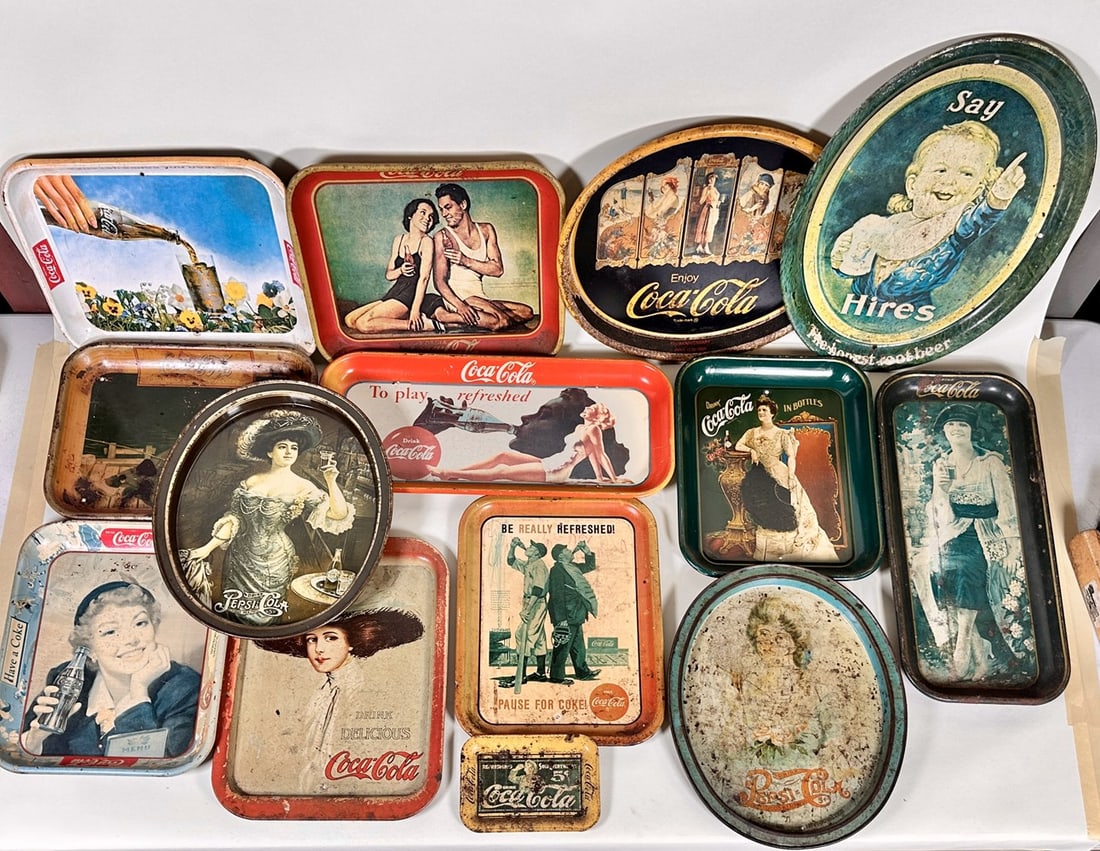 COCA-COLA SERVING TRAYS: LOT OF VINTAGE SERVING TRAYS, ALL WITH WEAR CONSISTENT WITH USE, HANDLING AND DISPLAY. AVERAGE 10"X14"