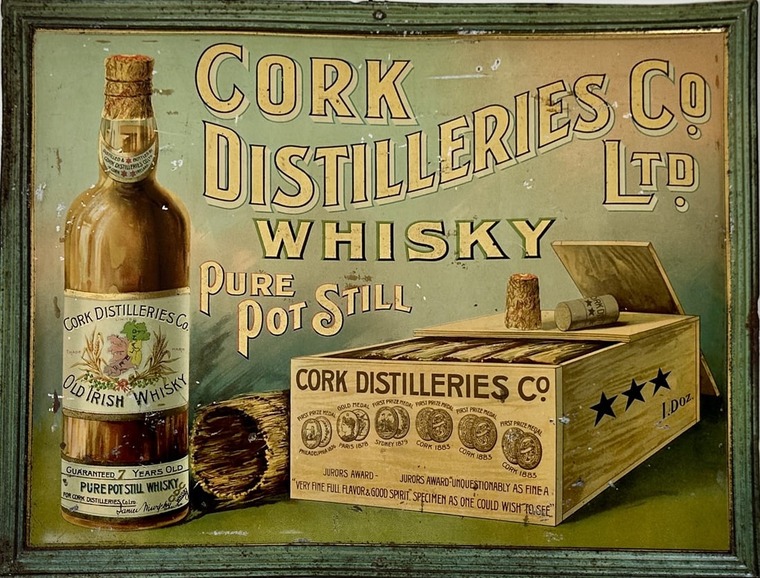 CORK DISTILLERIES LTD. WHISKEY ADVERTISING SIGN: SINGLE SIDED TIN, EMBOSSED EDGES. SCATTERED PITTING, TONING. 12"X16"