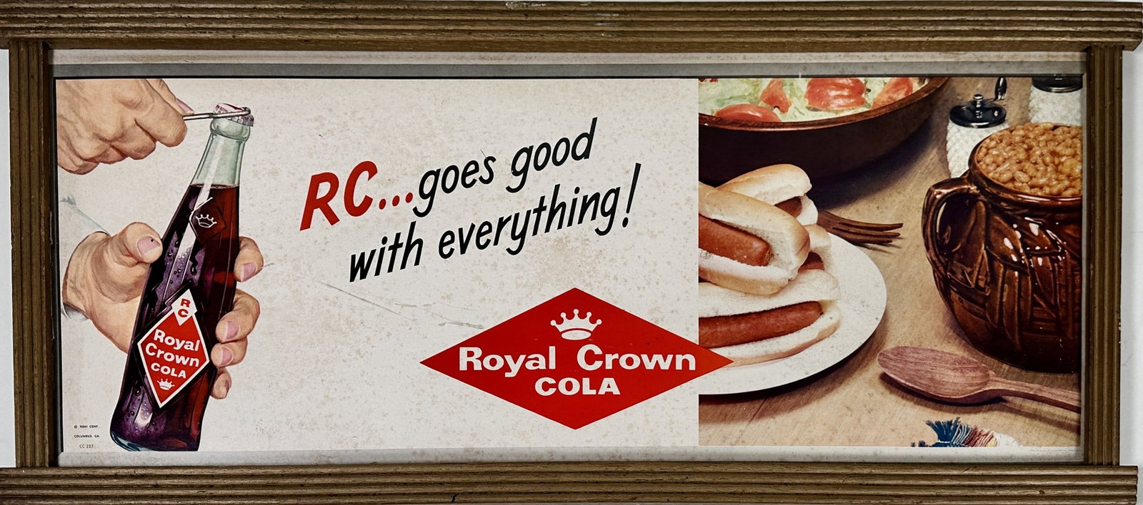 RC COLA ADVERTISING: ORIGINAL WOODEN FRAMED LITHOGRAPH ADVERTISING FOR ROYAL CROWN COLA - GOES GOOD WITH EVERYTHING. TONING. 12"X29"
