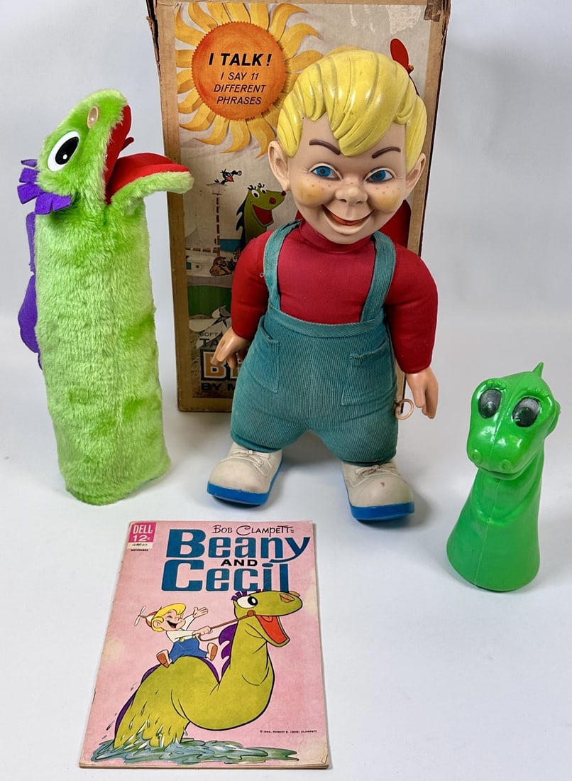 1961 MATTEL TALKING BEANY: PULL ACTION TALKING BEANY AND CECIL. INCLUDES A CECIL HAND PUPPET AND COMIC BOOK NOT ORIGINAL TO THE SET. ORIGINAL BOX WITH WEAR, LOSS OF TOP.