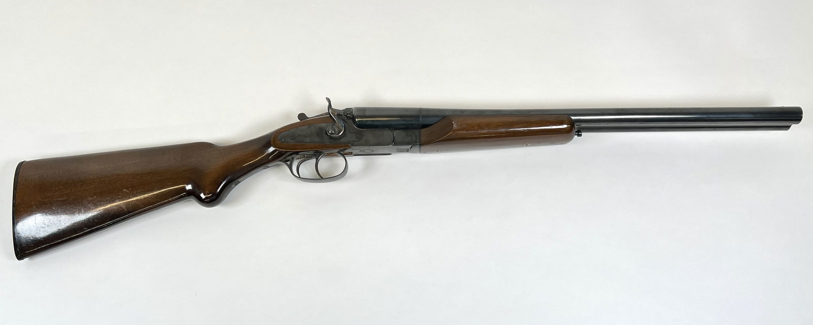 AMADEO ROSSI S.A. SBS 12 GAUGE: AMADEO ROSSI - BRAZIL, SIDE BY SIDE 12 GAUGE SHOTGUN. PERCUSSION CAP, A FEW AREAS OF MINOR PITTING. SERIAL 523477. REQUIRES FFL/C&R TRANSFER.