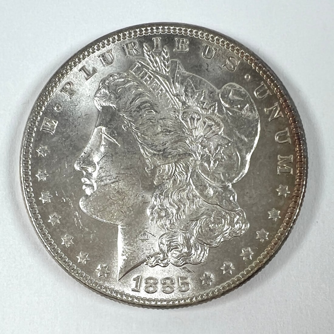 1885 MORGAN SILVER DOLLAR UNC (1 of 2)