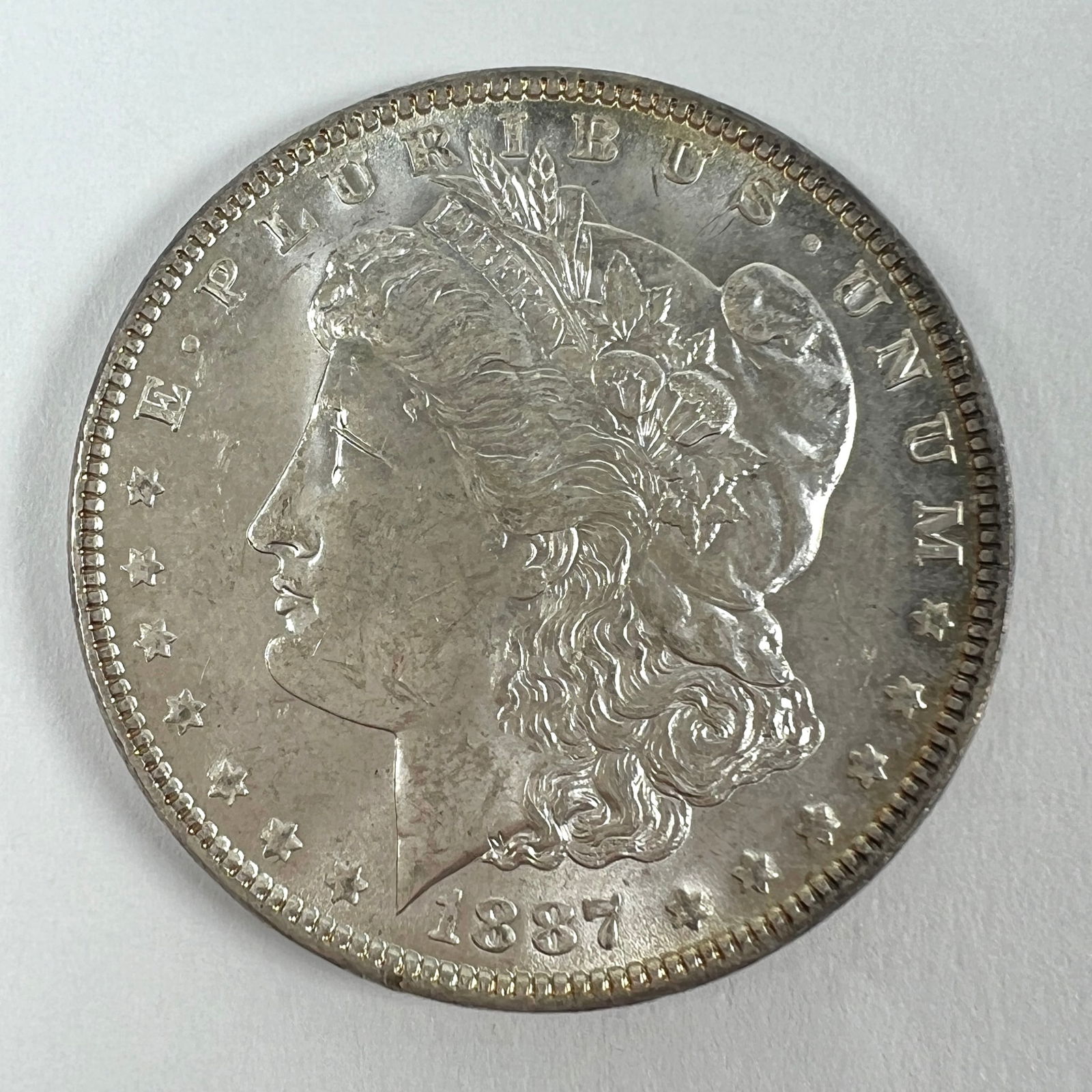 1887 MORGAN SILVER DOLLAR BU (1 of 2)