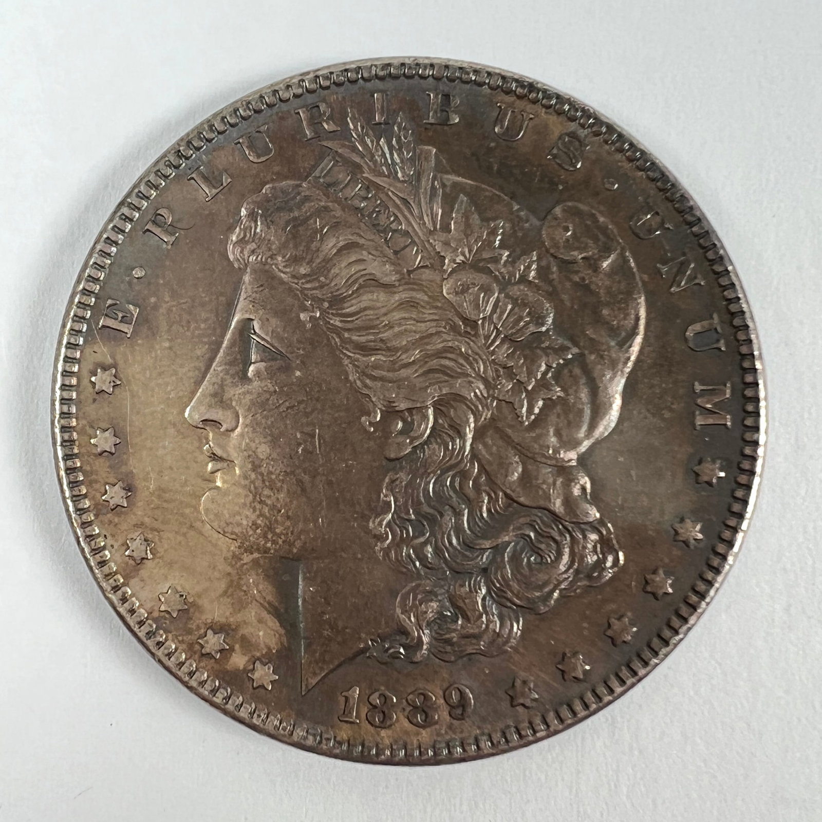 1889 MORGAN SILVER DOLLAR BU (1 of 2)