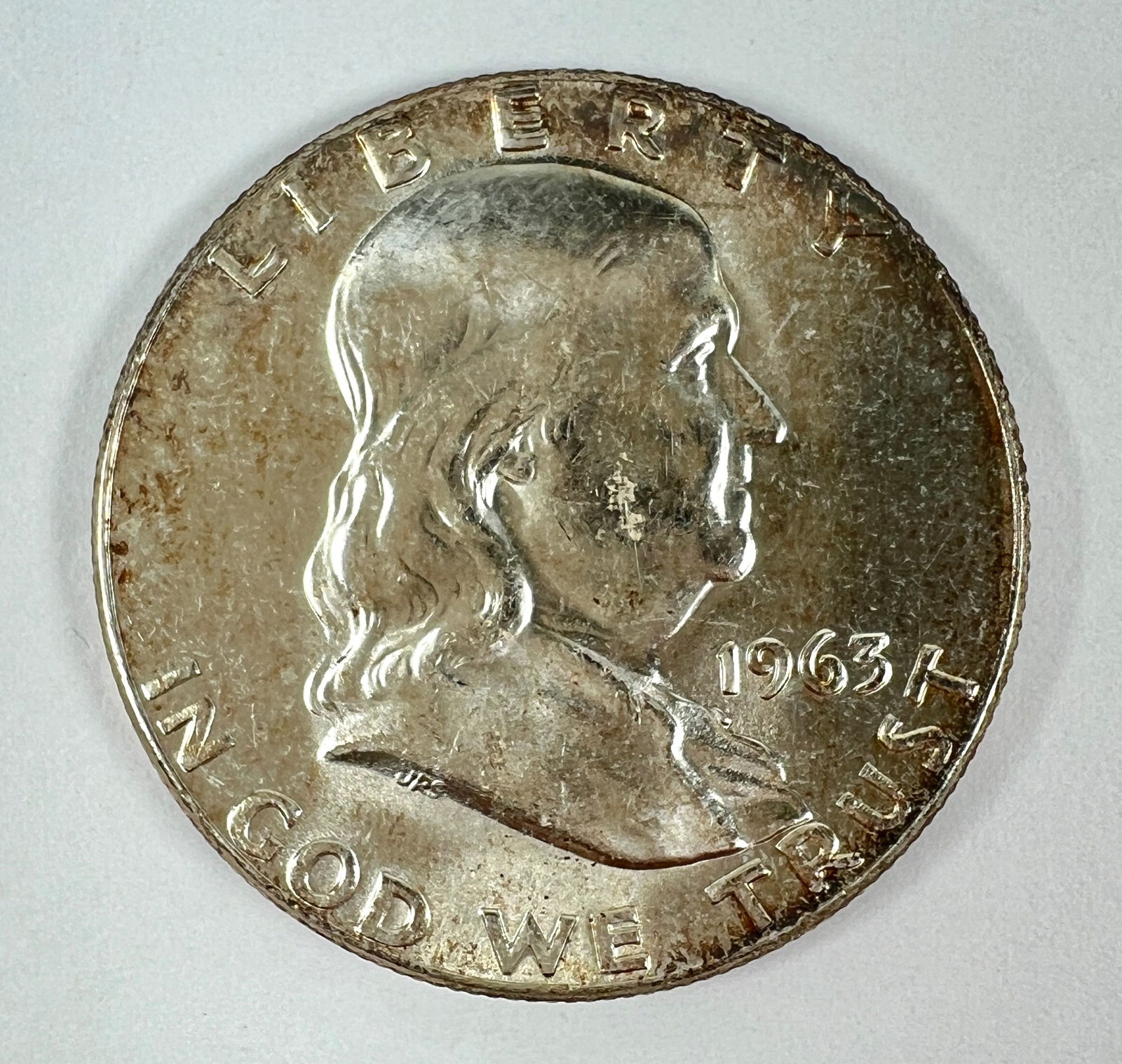 1963 FRANKLIN HALF DOLLAR UNC (1 of 2)