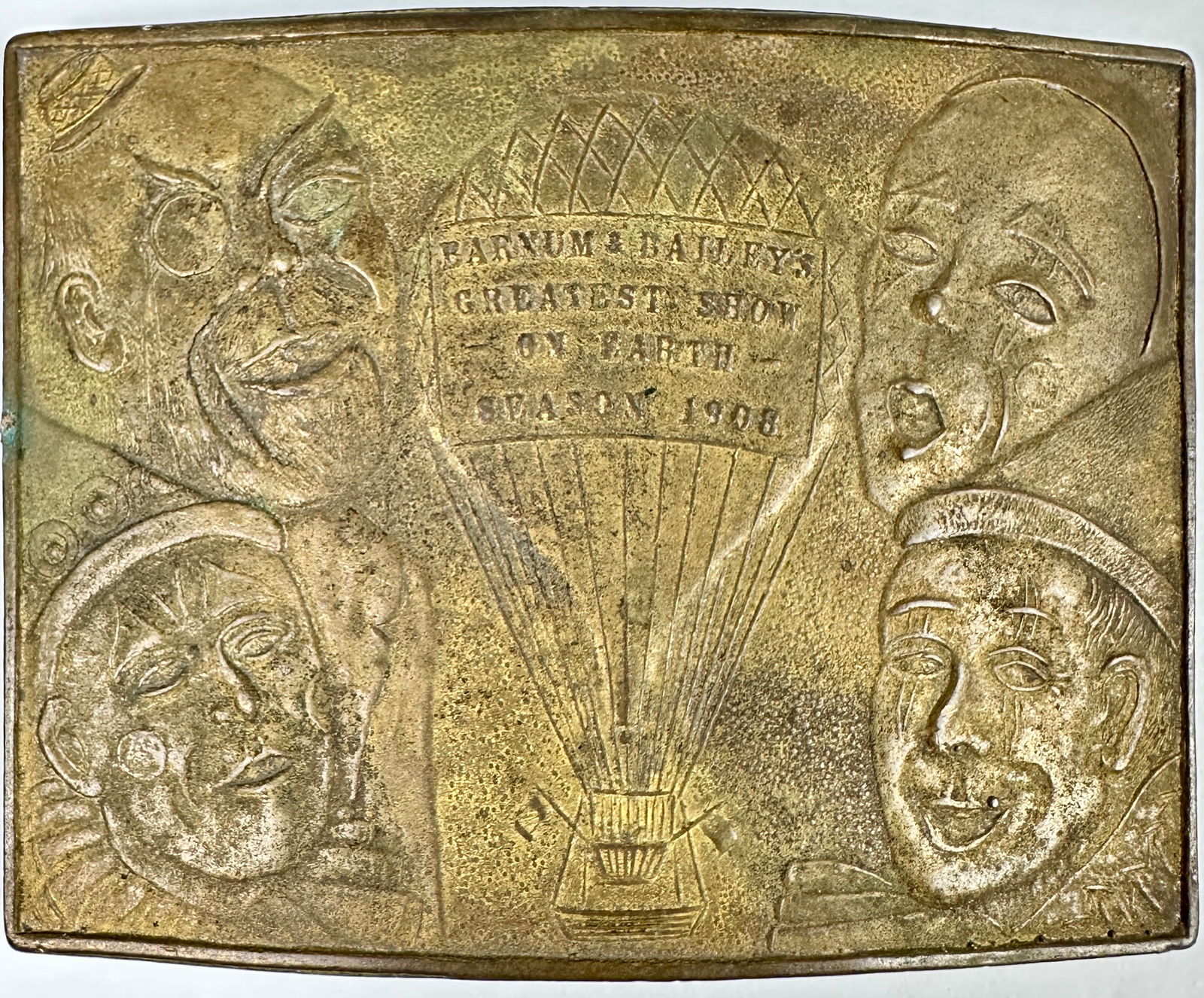 Barnum & Bailey Souvenir Belt Buckle: A souvenir buckle to commemorate the 1908 season, Tiffany mark on verso. A brass buckle fantasy piece of the mid-20th century.