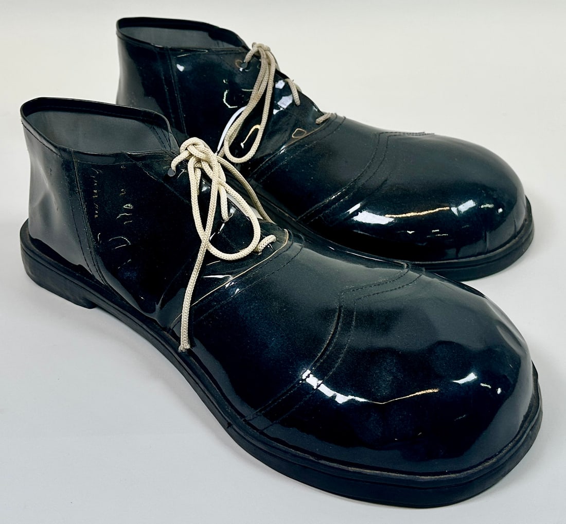 Novelty clown shoes: Patent vinyl novelty clown shoes.