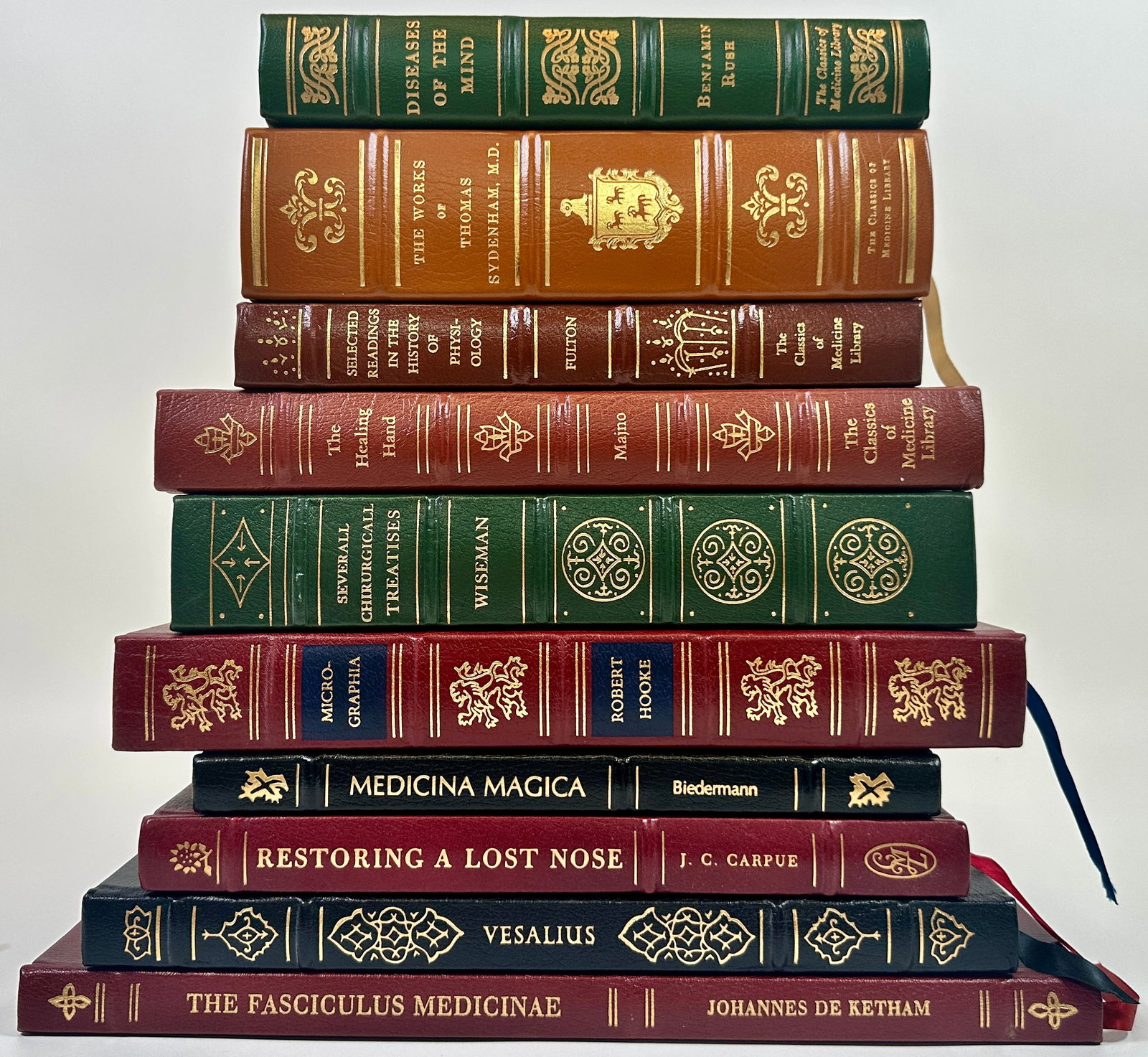 Classics of the Medical Library - Deluxe Editions: Gilt leather bound editions, all in excellent condition. Titles: Diseases of the Mind, The Works of Thomas Sydenham, Selected Readings in the History of Physiology, The Healing Hand, Micrographia, Med