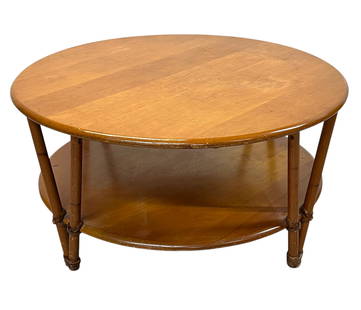 HEYWOOD WAKEFIELD COFFEE TABLE: VINTAGE HW ROUND COFFEE TABLE. GOOD VINTAGE CONDITION. 36"X17". REQUIRES THIRD PARTY SHIPPING/TRANSPORTATION.