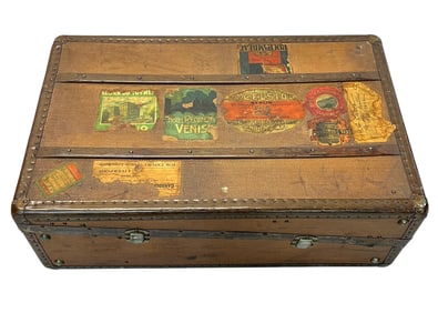 WELL-TRAVELED STEAMER TRUNK