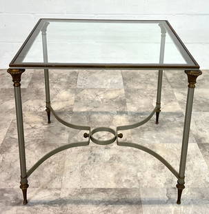 MAISON JANSEN STYLE SIDE TABLE: BRUSHED STEEL WITH BRONZE ACCENTS, GLASS TOP. IMPRESSED MARK, ITALY, ON ONE FOOT. 24"X24"X22". REQUIRES THIRD PARTY SHIPPING/TRANSPORTATION.