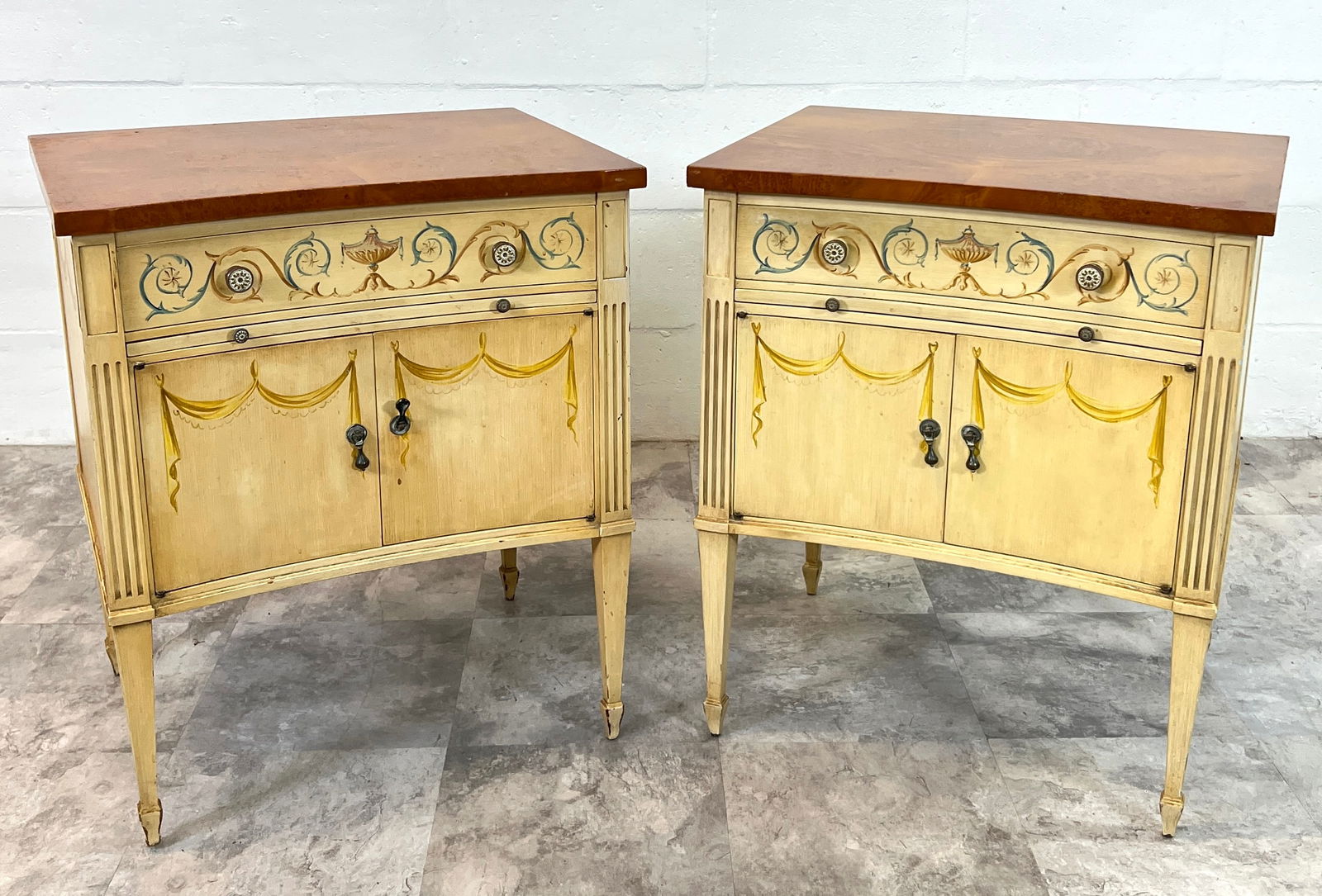 JOHN SCALIA FOR SCHMIEG & KOTZIAN SIDE TABLES: PAINT DECORATED COMMODES WITH SINGLE UPPER DRAWER AND LOWER DOUBLE DOOR STORAGE COMPARTMENT. VERY GOOD. 22"X17"X26". REQUIRES THIRD PARTY SHIPPING/TRANSPORTATION.