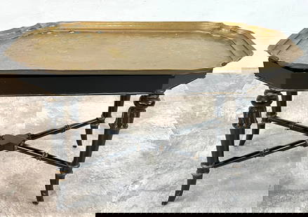 LA MAISON SUPREME TABLE: EBONIZED WOODEN FRAME WITH GILT DECORATIONS, REMOVEABLE BRASS TRAY. 30"X17"X19". REQUIRES THIRD PARTY SHIPPING/TRANSPORTATION.