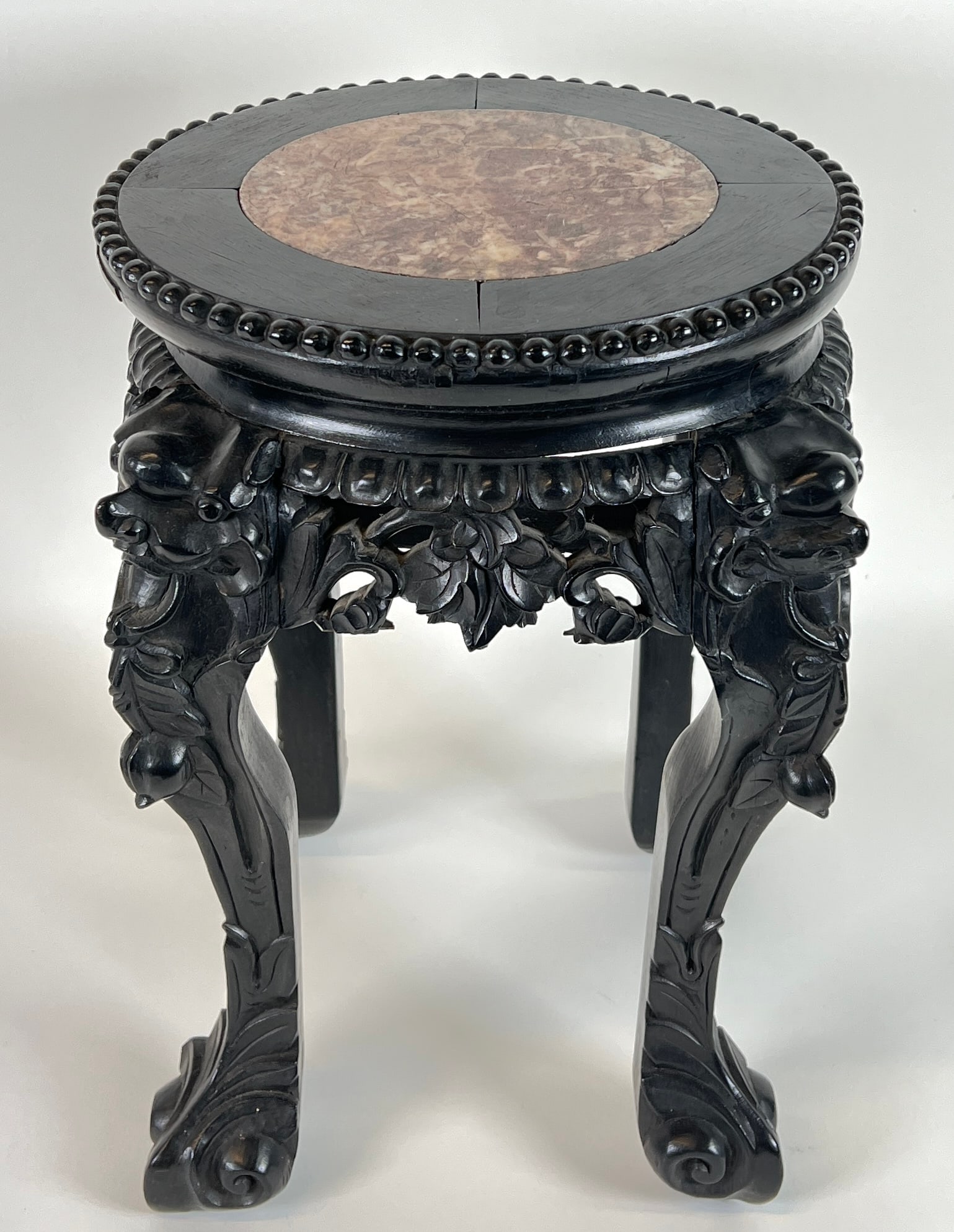 CHINESE HARDWOOD MARBLE TOP TABLE: WOODE CARVINGS WITH MARBLE INSET TOP. 15"X13"X13". REQUIRES THIRD PARTY SHIPPING/TRANSPORATION.