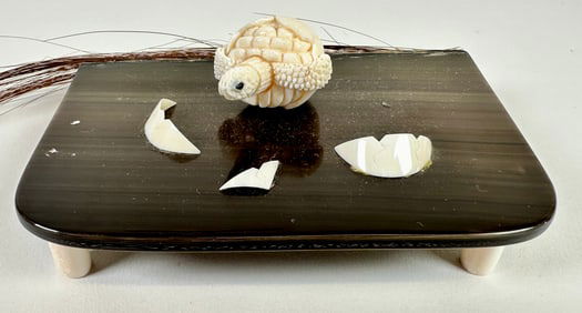 ORGANIC CARVING OF A TURTLE