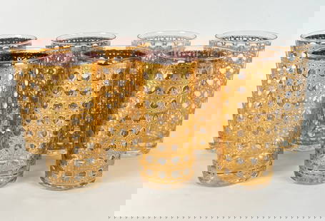 CULVER CANELLA BASKETWEAVE HIGH BALL GLASSES: SET OF 7 22K GOLD BASKETWEAVE PATTERN HIGH BALL GLASSES BY CULVER. EACH 5.75"