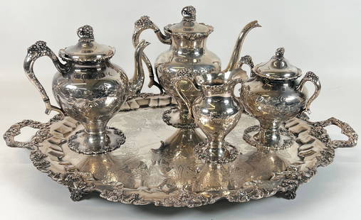 E.G. WEBSTER & CO. SILVER PLATE SERVING SET: LARGE PLATTER, TEA, SUGAR AND CREAMER. TRAY IS 26"X17". THIRD PARTY SHIPPING TRANSPORTATION REQUIRED.