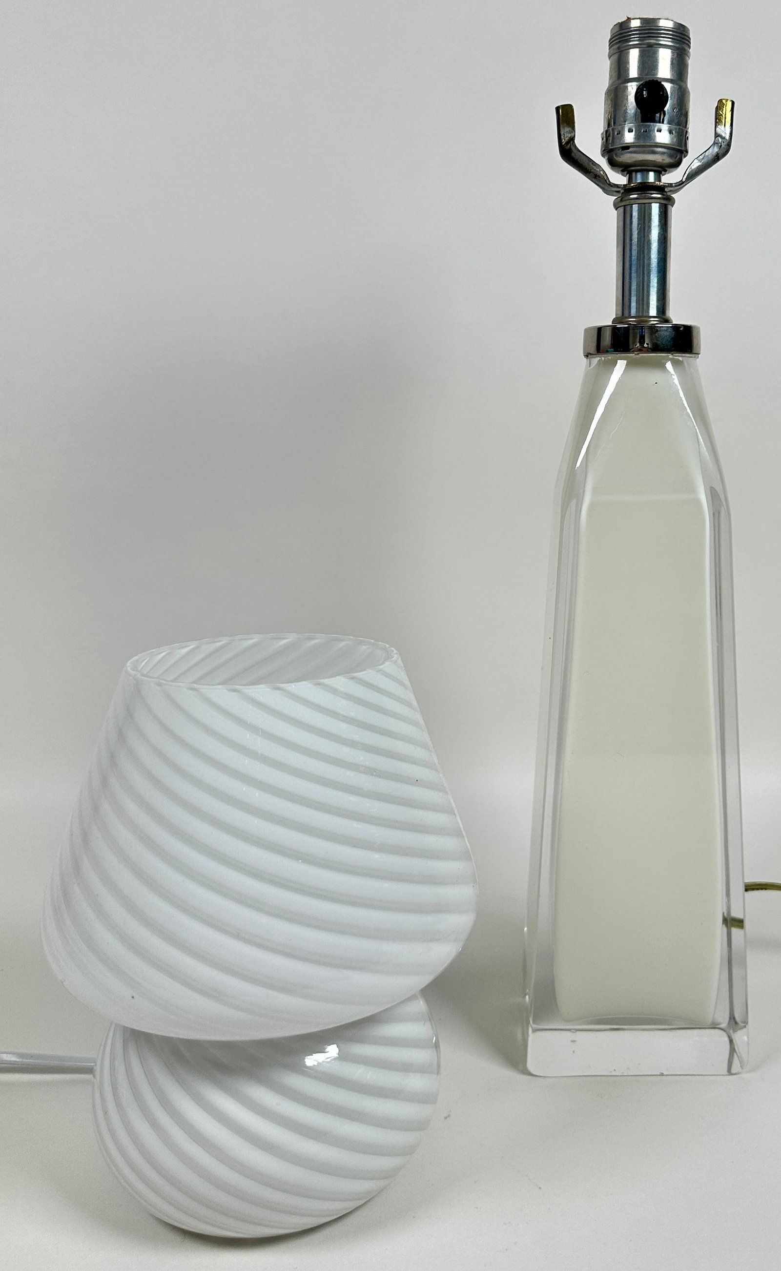 PAIR OF ART GLASS LAMPS: MUSHROOM SWIRL ACCENT LAMP AND CASED TABLE LAMP. TABLE LAMP IS 17", MUSHROOM IS 8"