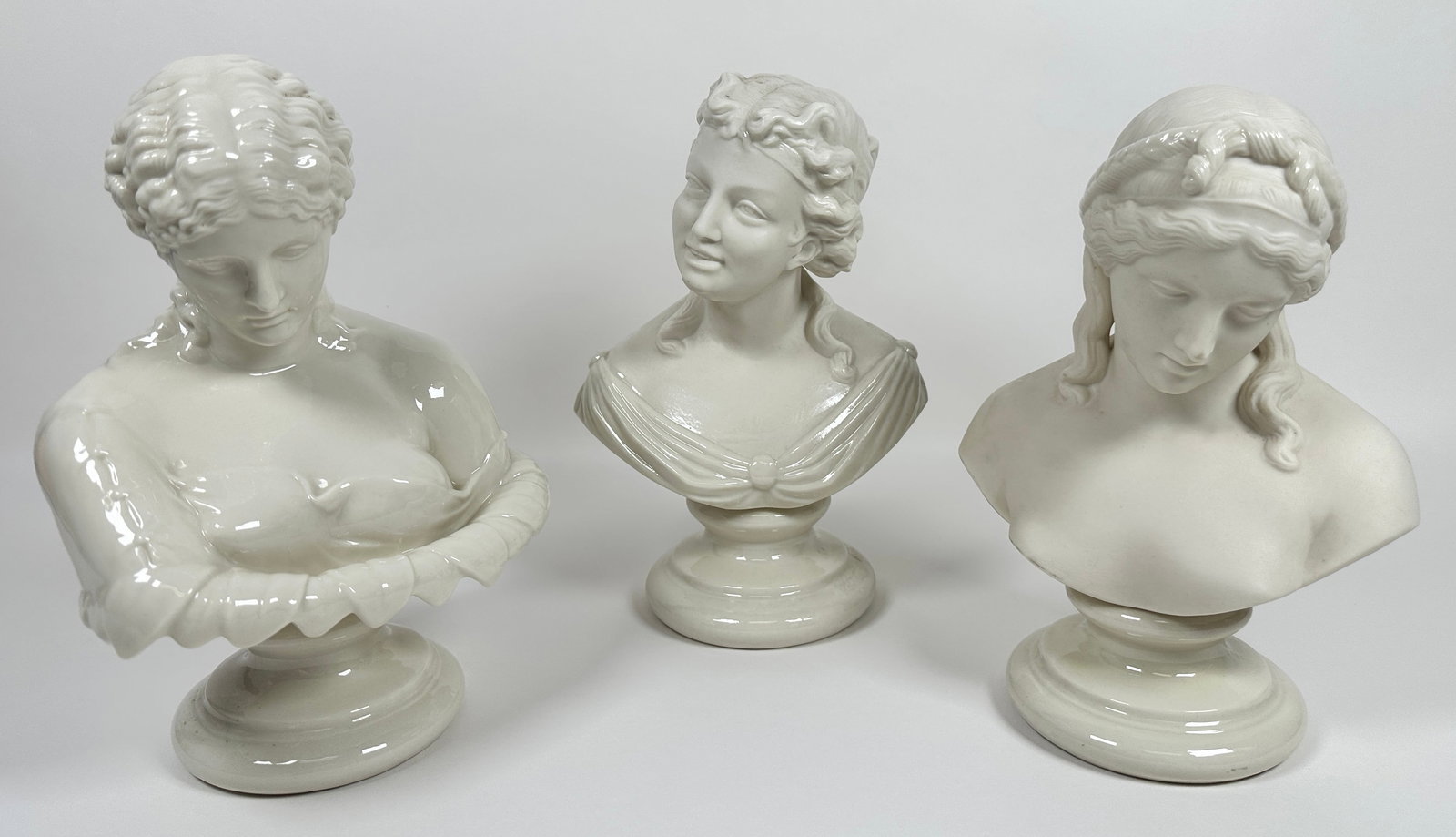 BELLEEK IRISH PORCELAIN FIGURES: TRIO OF BELLEEK PORCELAIN BUSTS. 12"H