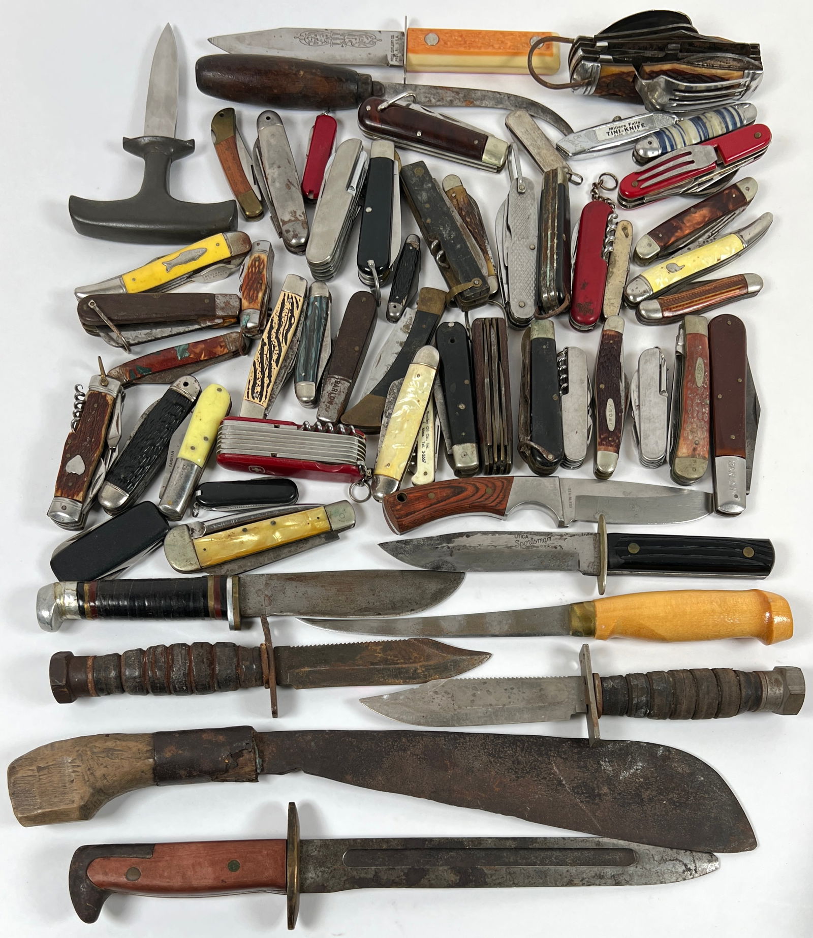COLLECTION OF KNIVES: ESTATE COLLECTION INCLUDING: J. MARTTIINI, LEATHER HANDLED FIGHTING KNIVES, KAMP-KING, PROV. CUTTLERY, COLONIAL, SABRE, SWISS AND OTHERS. CARTON IS 15"X6"X12" AND 25 POUNDS