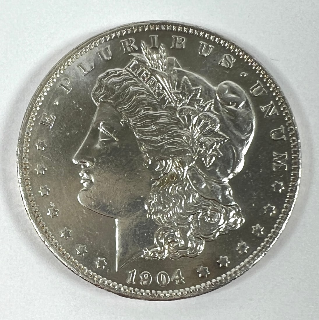 1904-O MORGAN SILVER DOLLAR - UNC (1 of 2)