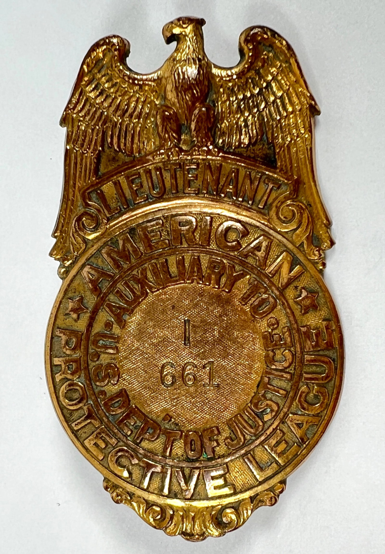 AMERICAN PROTECTIVE LEAGUE OBSOLETE BADGE: LIEUTENANT BADGE - AMERICAN PROTECTIVE LEAGUE, AUXILLARY U.S. DEPT. OF JUSTICE. PIN-BACK. 2.25"X1.375"