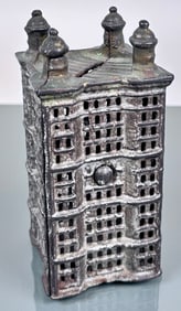 A.C. WILLIAMS CAST IRON SKYSCRAPER COIN BANK