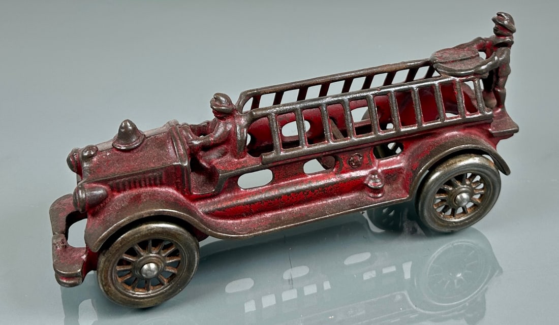 A.C. WILLIAMS CAST IRON FIRE TRUCK: HOOK AND LADDER FIRETRUCK, ORIGINAL WITH PAINT LOSS COMMENSURATE WITH AGE. 7.5"X2.5"X3"