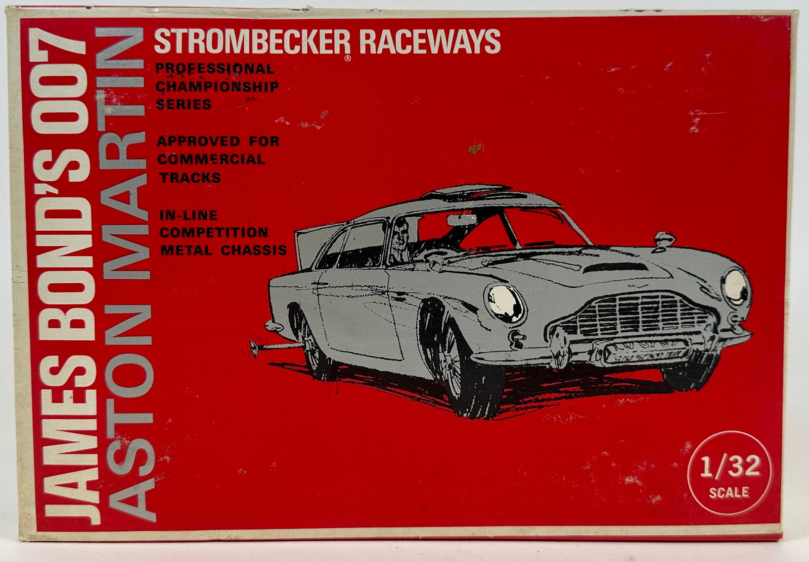 STROMBECKER JAMES BOND 007 SLOT CAR: COMPLETE 007 SLOT CAR IN ORIGINAL BOX WITH MANUAL. 1/32 SCALE. ORIGINAL BOX. CARTON IS 10"X6"X3"