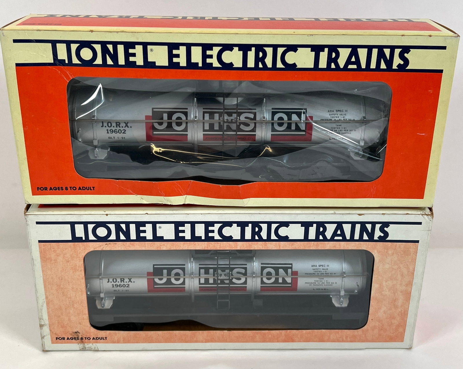 LIONEL ELECTRIC TRAINS - 6-19602 JOHNSON TANK CAR: PAIR OF JOHNSON SINGLE DOME TANK CARS. AS NEW IN ORIGINAL BOXES. CARTON TOTAL IS 5"X6"X11"