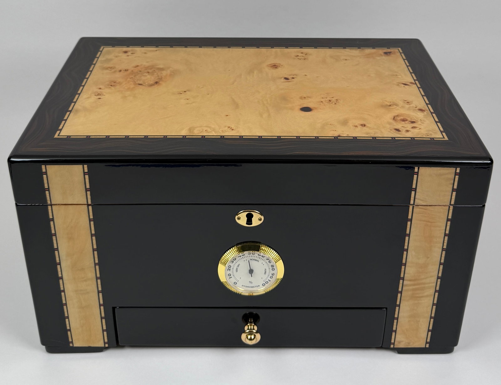CUBAN CRAFTERS PREMIUM CIGAR HUMIDOR: EBONY WITH BIRD'S EYE MAPLE, BRASS FITTED. AS NEW. 16"X9.5"X9"