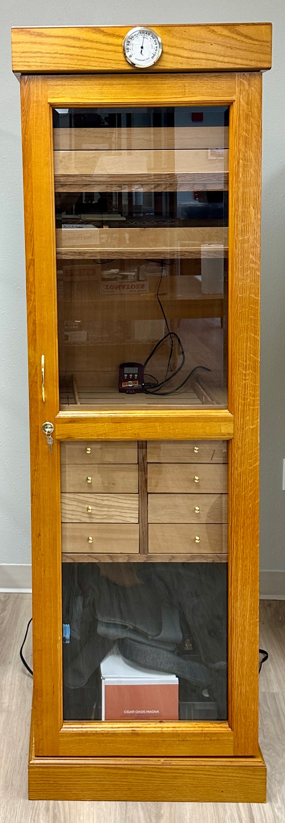 TOWER OF POWER HUMIDOR CABINET: CIGAR HUMIDOR CABINET, CIGAR OASIS MAGNA, MULTI-DRAWER, KEYED. REQUIRES THIRD PARTY SHIPPING OR LOCAL PICK UP. 16"D, 21"W, 72"H