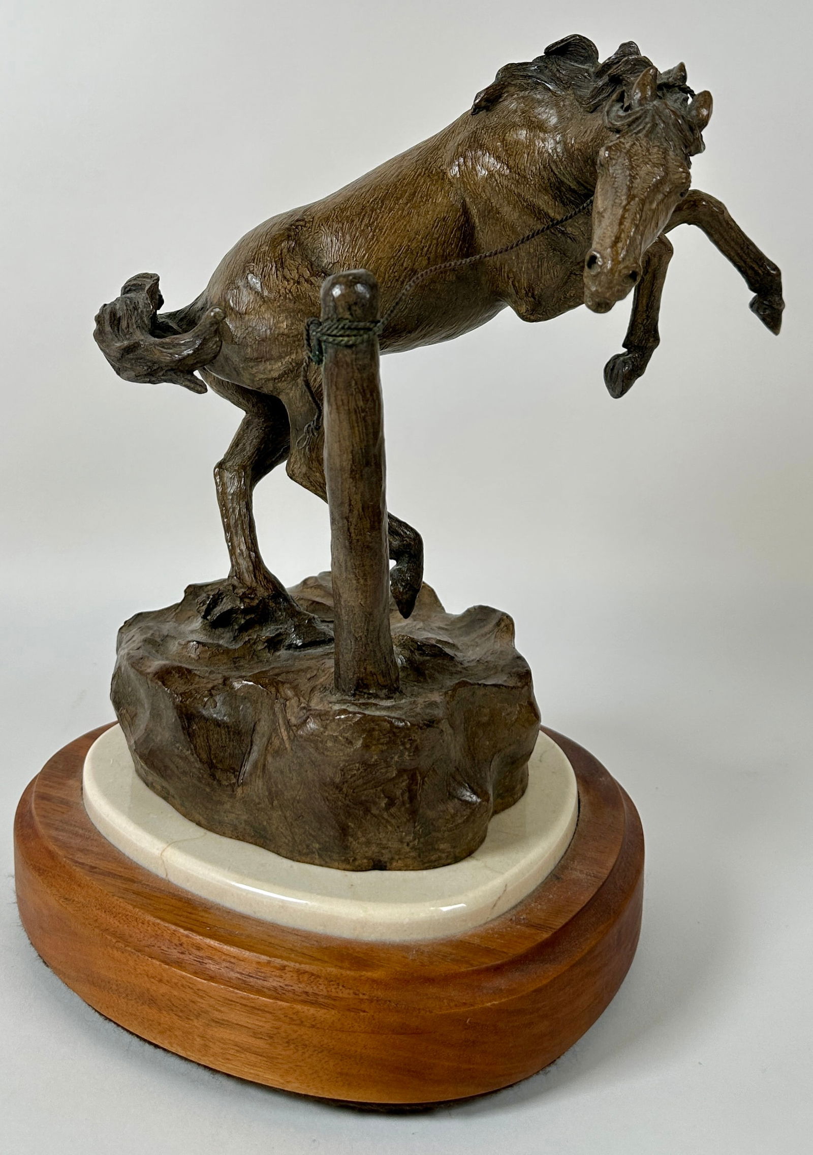 DON HUNTSMAN BRONZE HORSE SCULPTURE: BRONZE HORSE SCULPTURE MOUNTED ON ROTATING WOODEN BASE. SIGNED, 1991. 12.5"H