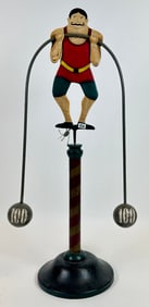 NOVELTY STRONGMAN BALANCE SCULPTURE