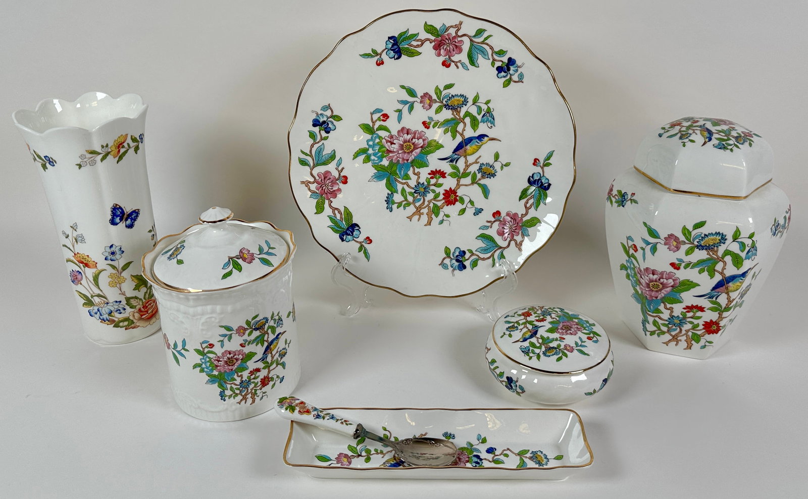 AYNSLEY - PEMBROKE CHINA: BIRD, BUTTERFLY AND FLORAL ACCENT CHINA. SPOON, REST, BISCUIT JAR, JARDINIERE, TRINKET, PLATTER AND VASE. TALLEST IS 8.5"