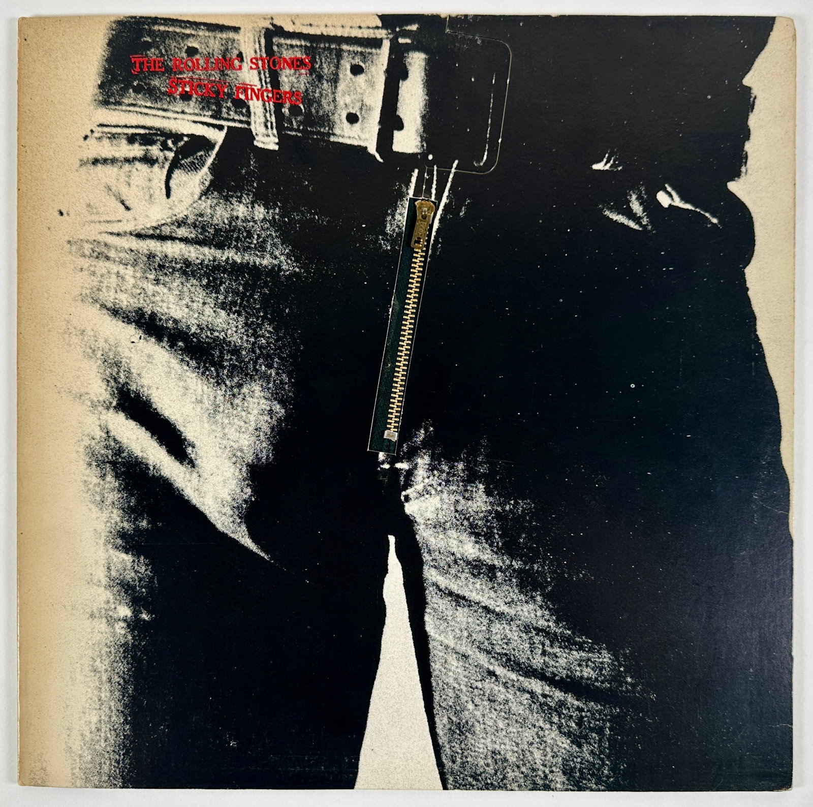 THE ROLLING STONES - STICKY FINGERS LP ALBUM: THE ROLLING STONES - STICKY FINGERS, 1974. ANDY WARHOL DESIGN, ZIPPER COVER, VARIATION.