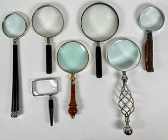 MAGNIFYING GLASSES
