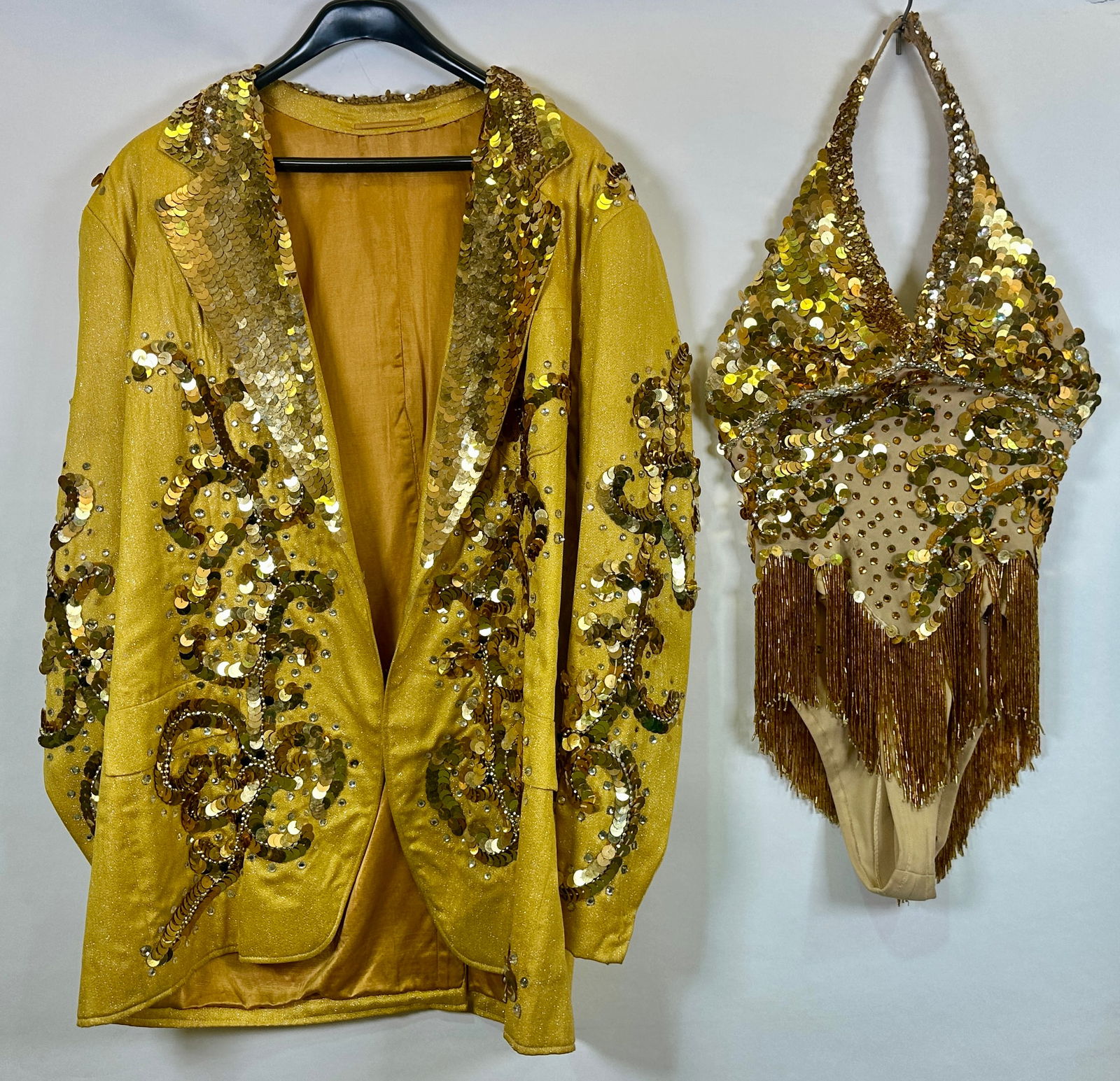 VENKO AND INNA LILOV CIRCUS WARDROBE: THE LILOV'S AND THEIR BEARS PERFORMED THROUGHOUT THE LAST CENTURY WITH THE RINGLING BROS. AND BARNUM AND BAILEY CIRCUS AMONG OTHER WORLDWIDE SHOWS. ORIGINAL WARDROBE. LADIES GOLD WARDROBE DECORATE IN