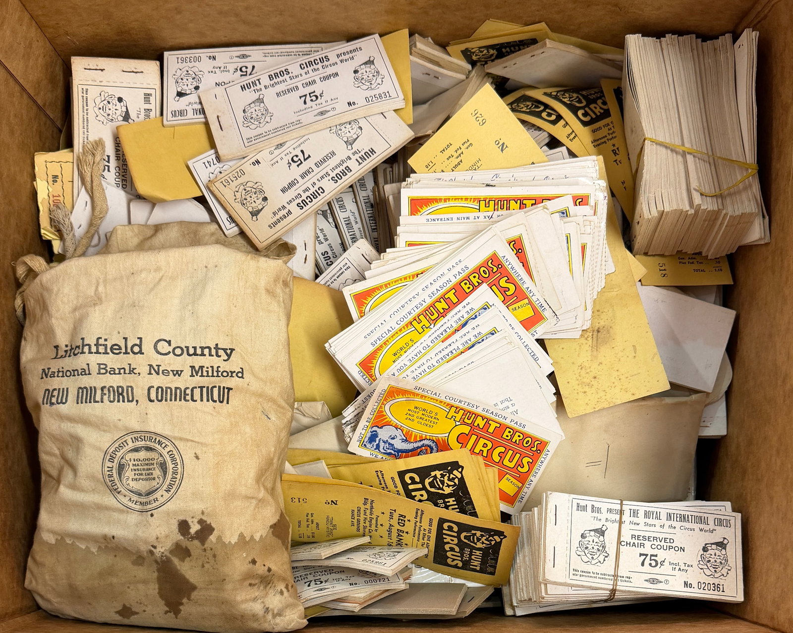 HUNT BROS. CIRCUS TICKETS: LIKELY FOR THE 1970'S REVAMP OF THE ORIGINAL SHOW. A BANKER'S BOX QUANTITY OF CIRCUS TICKETS. THE HUNT BROS. CIRCUS OPERATED FROM 1863-1969; 1975-77.