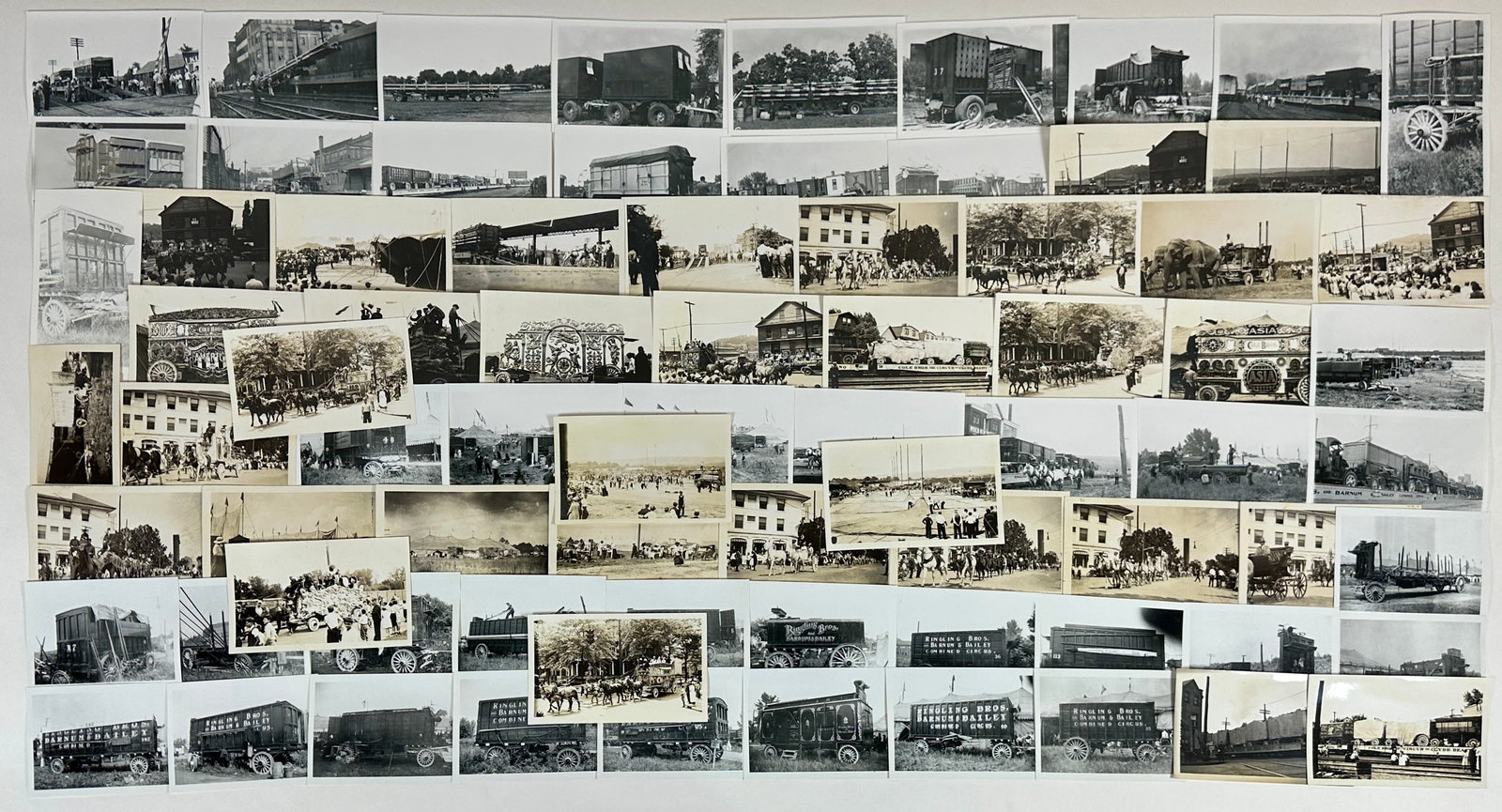 CIRCUS PHOTOGRAPH COLLECTION: SNAPSHOT SIZED PHOTOS, WAGONS, PARADES, LOTS, UNLOADING TRAIN.