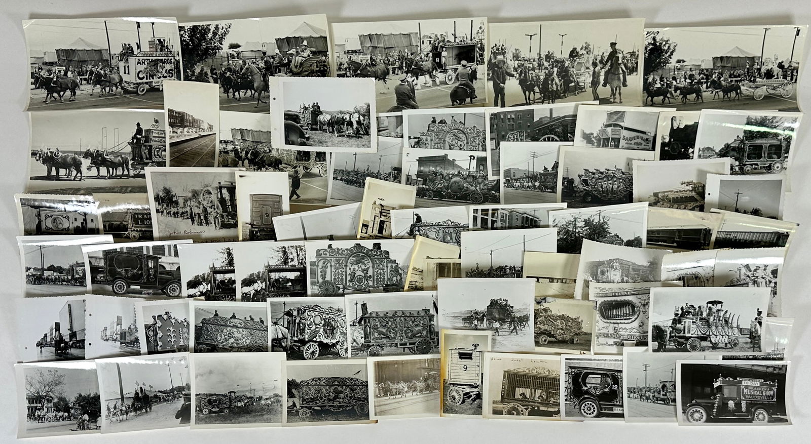 CIRCUS PHOTOGRAPH COLLECTION: SNAPSHOT SIZED PHOTOGRAPHS, TRAINS, WAGONS, PARADES. 1920'S-40'S