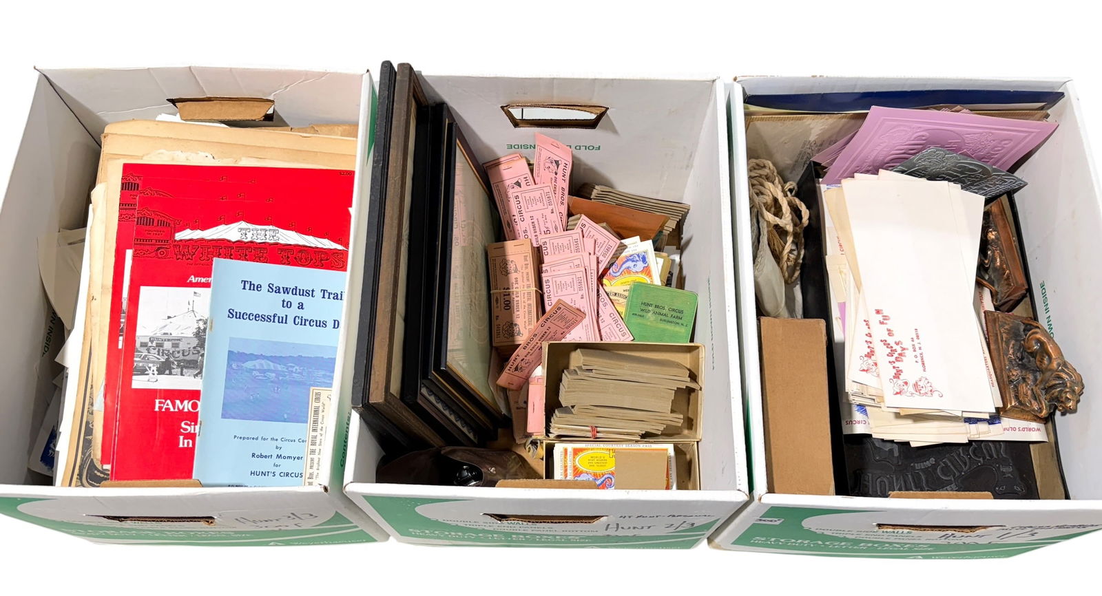 HUNT BROS. CIRCUS EPHEMERA ARCHIVE: THE HUNT BROS. CIRCUS WAS ONE OF AMERICA'S OLDEST RUNNING CIRCUSES BEGINNING IN 1892. COMPREHENSIVE ARCHIVE CONTAINED WITHIN THREE BANKER'S BOXES. INFORMATION PERTAINING TO FINANCIALS, PHOTOGRAPHS, AD