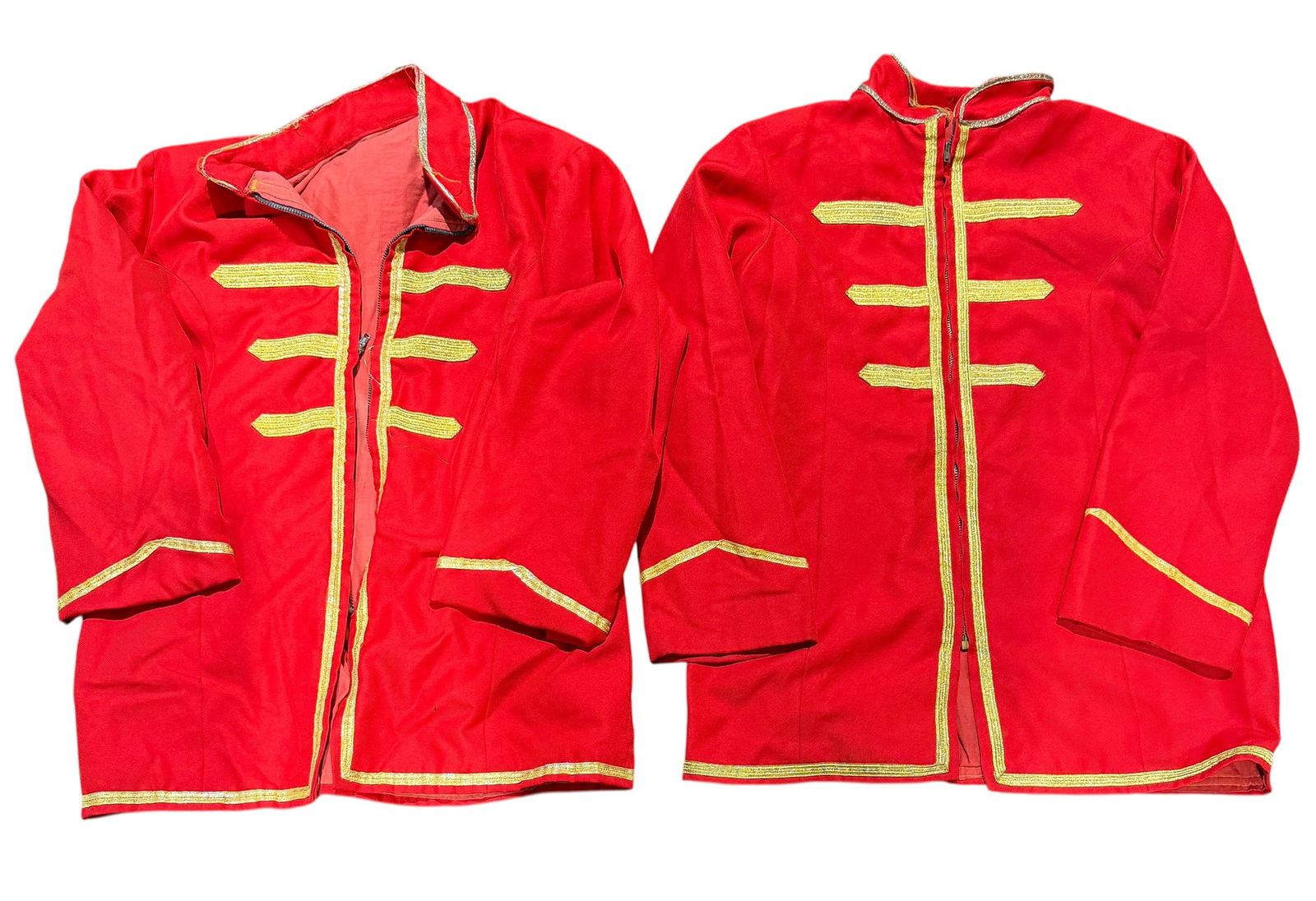 HUNT BROS. CIRCUS RINGMASTER JACKETS: THE HUNT BROS. CIRCUS WAS ONE OF AMERICA'S OLDEST RUNNING CIRCUSES BEGINNING IN 1892. PAIR OF RINGMASTER COATS, SIZE L/XL.