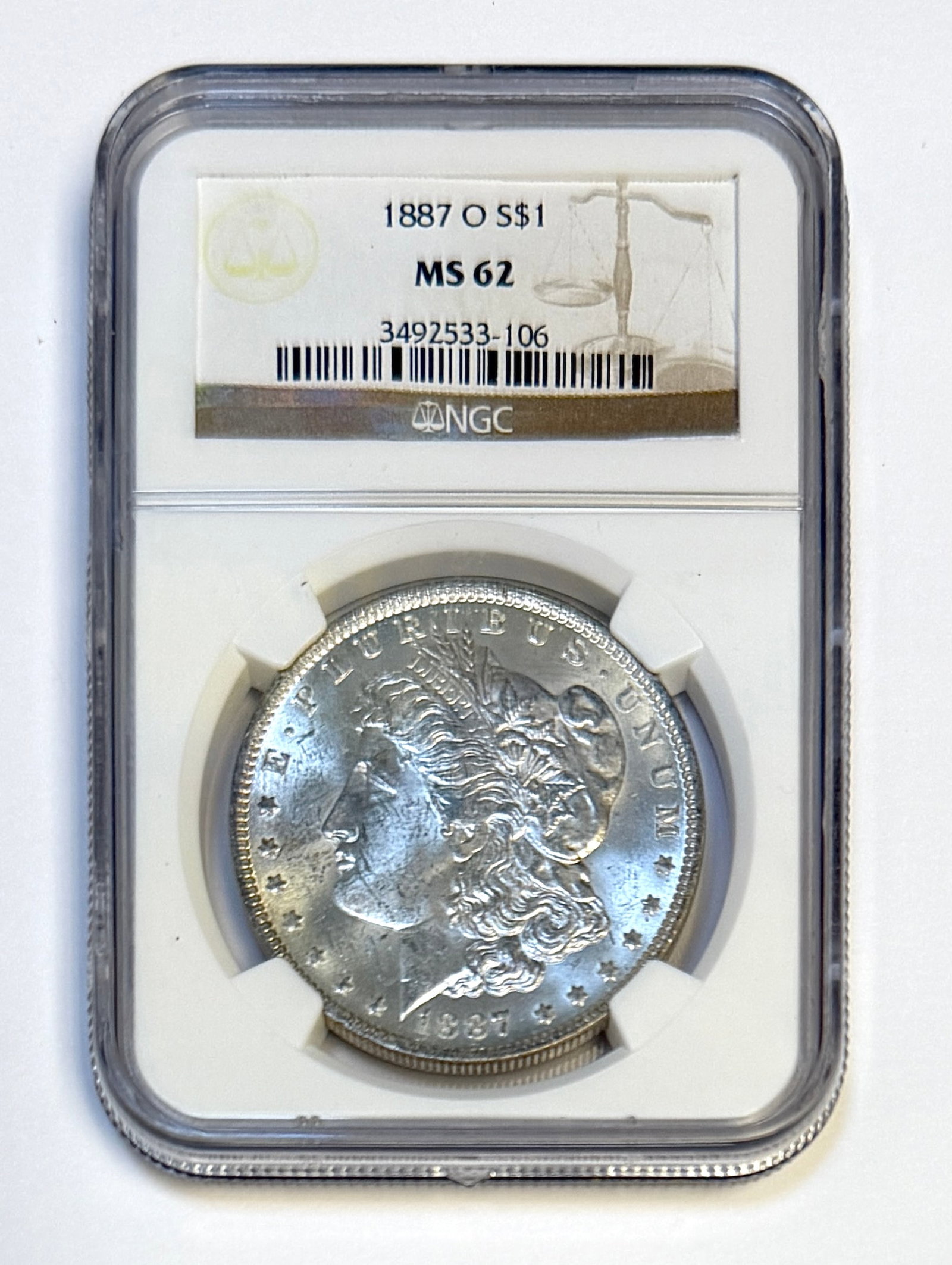 1887-O MORGAN SILVER DOLLAR: CERTIFIED MS62 BY NGC
