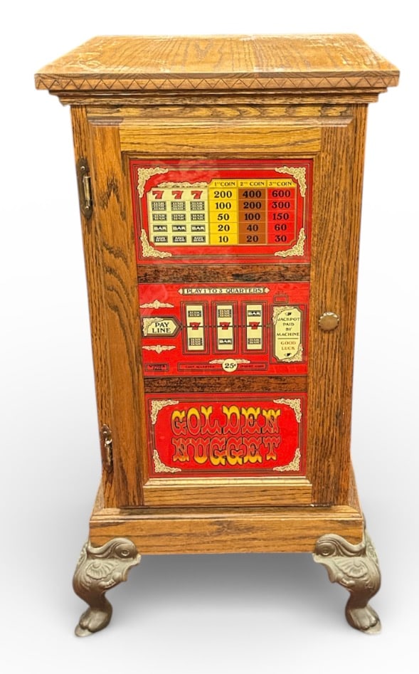 GOLDEN NUGGET SLOT MACHINE CABINET: OAK CABINET HAVING REVERSE PRINTED GLASS DOOR PANEL. 17.5"X17.5"X34"H