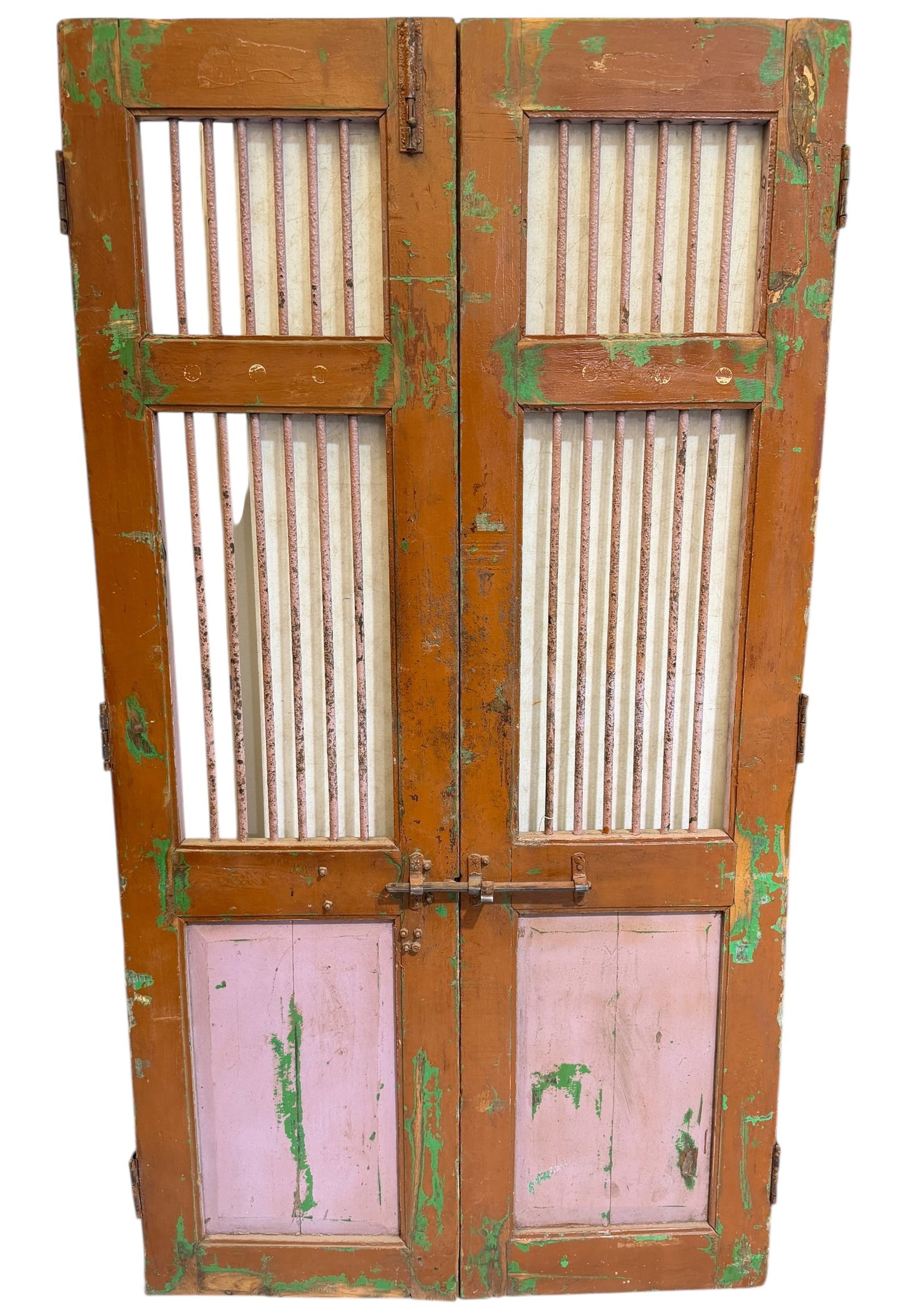 PAIR OF HEAVY CAGE DOORS: WOOD FRAMED WITH IRON ROD WINDOWS, DOORS FROM ARCHITECTURAL SALVAGE. 20"W, 73"H.