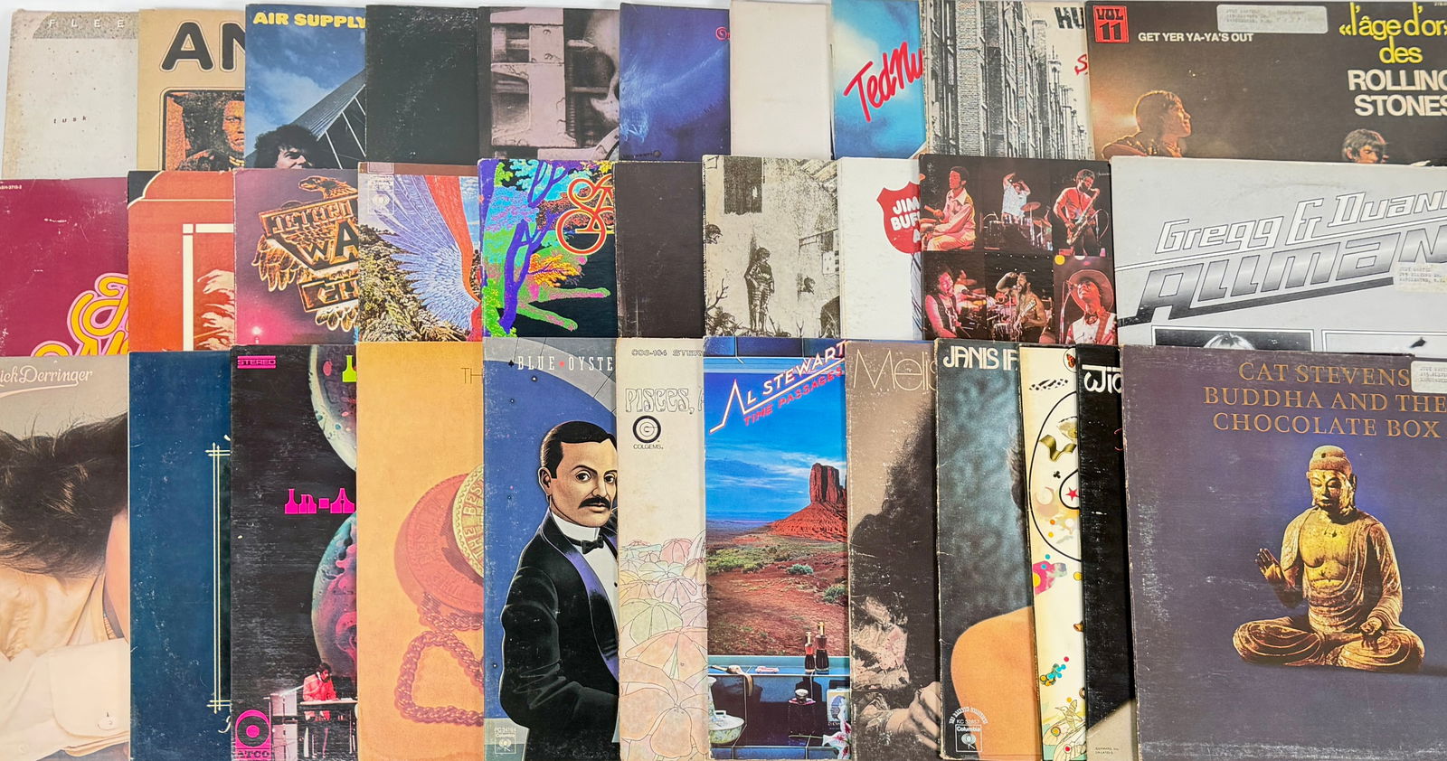 VINTAGE ROCK LP VINYL RECORD ALBUMS: 30+ ROCK ALBUMS FROM THE 1970'S AND 1980'S. FEW WITH PERSONAL PROPERTY LABELS ON FACE OF COVER. INCLUDING: WAR, LED ZEPPLIN, ROLLING STONES, FLEETWOOD MAC, SANTANTA, BLUE OYSTER CULT, JETHRO TULL, AIR