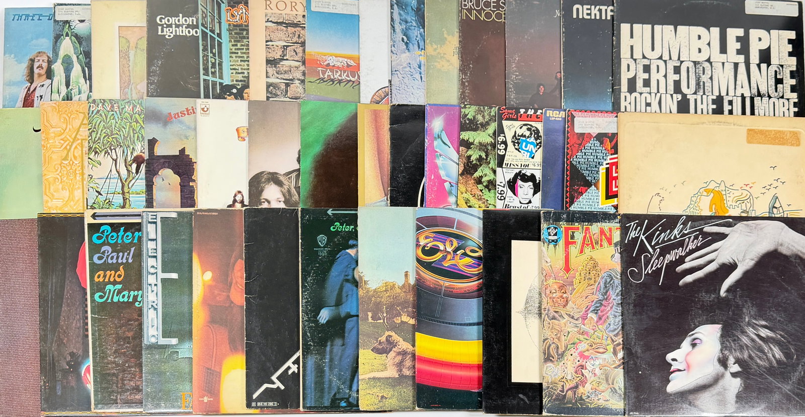 VINTAGE ROCK LP VINYL RECORD ALBUMS: 30+ ROCK ALBUMS FROM THE 1970'S AND 1980'S. FEW WITH PERSONAL PROPERTY LABELS ON FACE OF COVER. INCLUDING: LIGHTFOOT, SPRINGSTEEN, EMERSON-LAKE-PALMER, PPM, ELECTRIC LIGHT ORCHESTRA AND OTHERS.