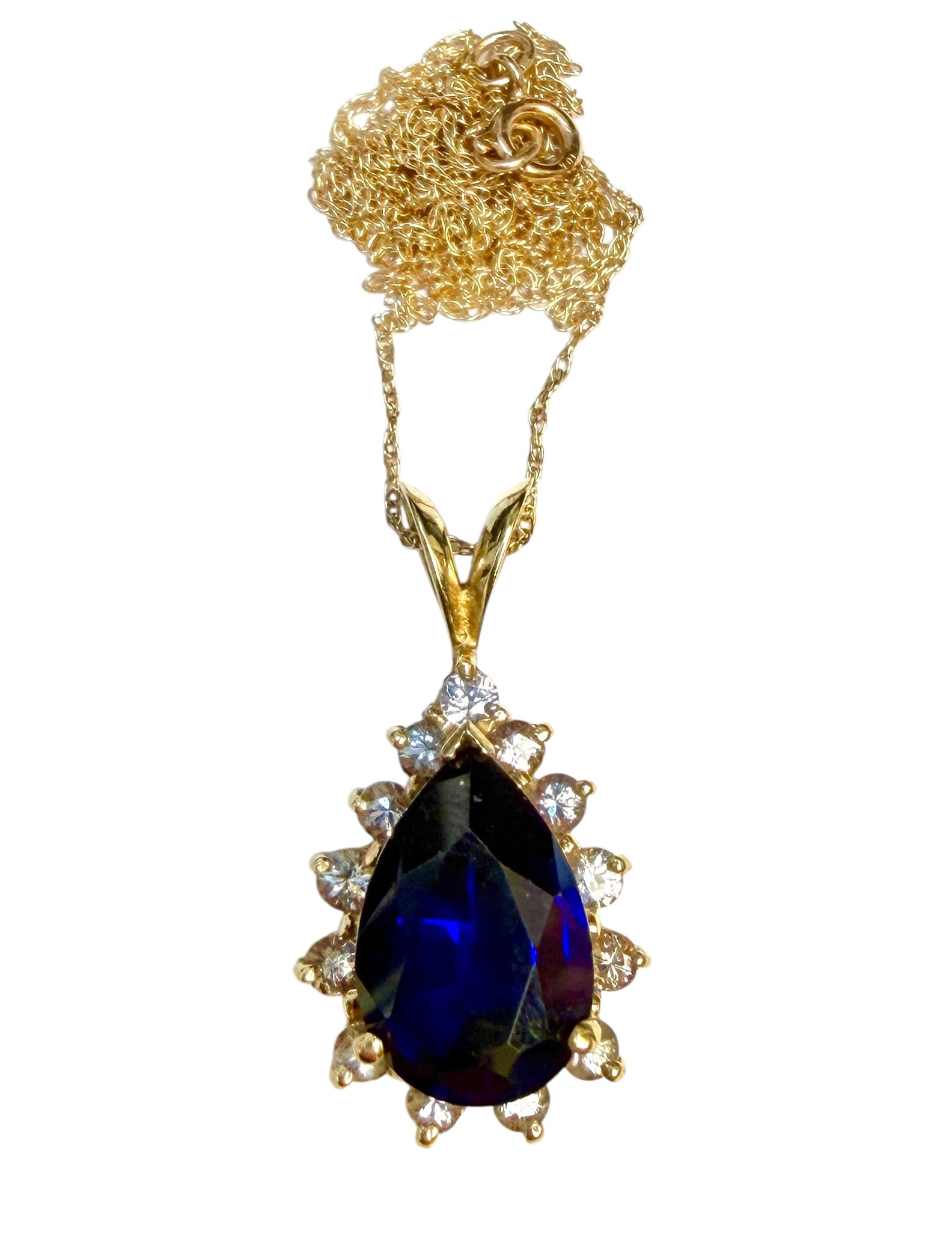 GOLD SAPPHIRE DIAMOND PENDANT NECKLACE: 10K YELLOW GOLD CHAIN WITH 14K GOLD BLUE SAPPHIRE WITH SURROUNDING DIAMONDS PENDANT. CHAIN IS 9". 3 GRAMS IN TOTAL WEIGHT.